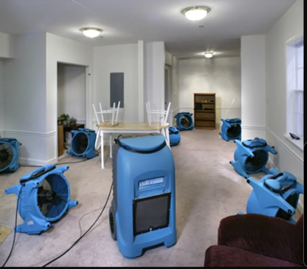 Air movers and dehumidifier setup for Water Damage Restoration in Douglasville