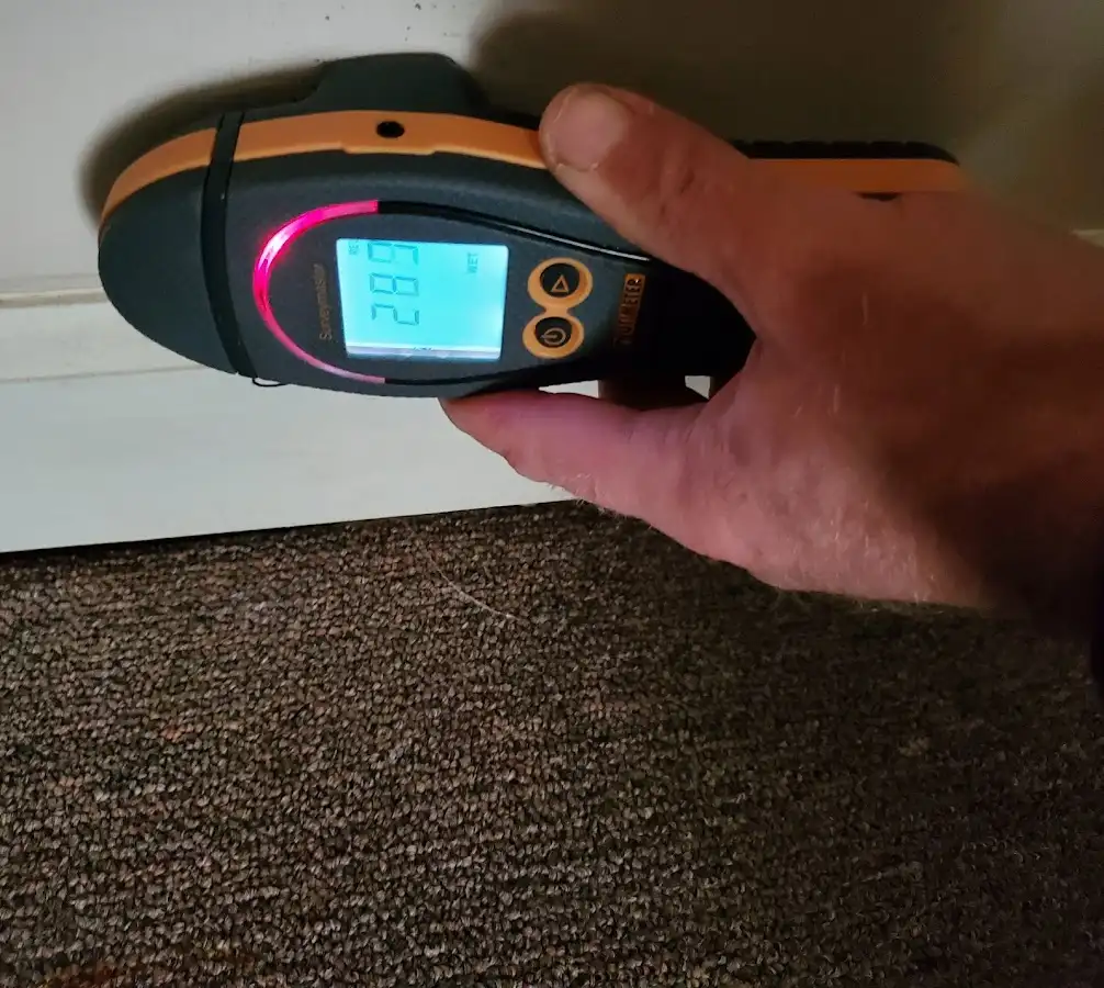 Moisture detection at baseboard during Burst Pipe Cleanup in Douglasville